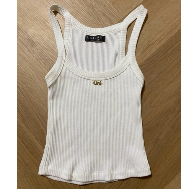 เสื้อกล้ามสีขาว ป้าย UNIGAM OFFICIAL  อก32-38 ไม่มีตำหนิ