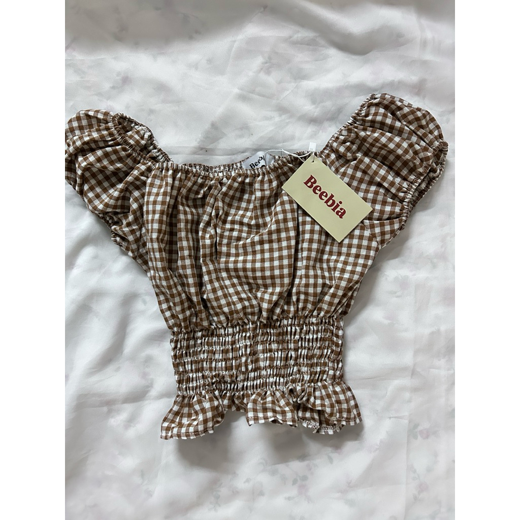 เสื้อปาดไหล่สม็อก ใส่สบาย ผ้าหนางานป้าย Beebia