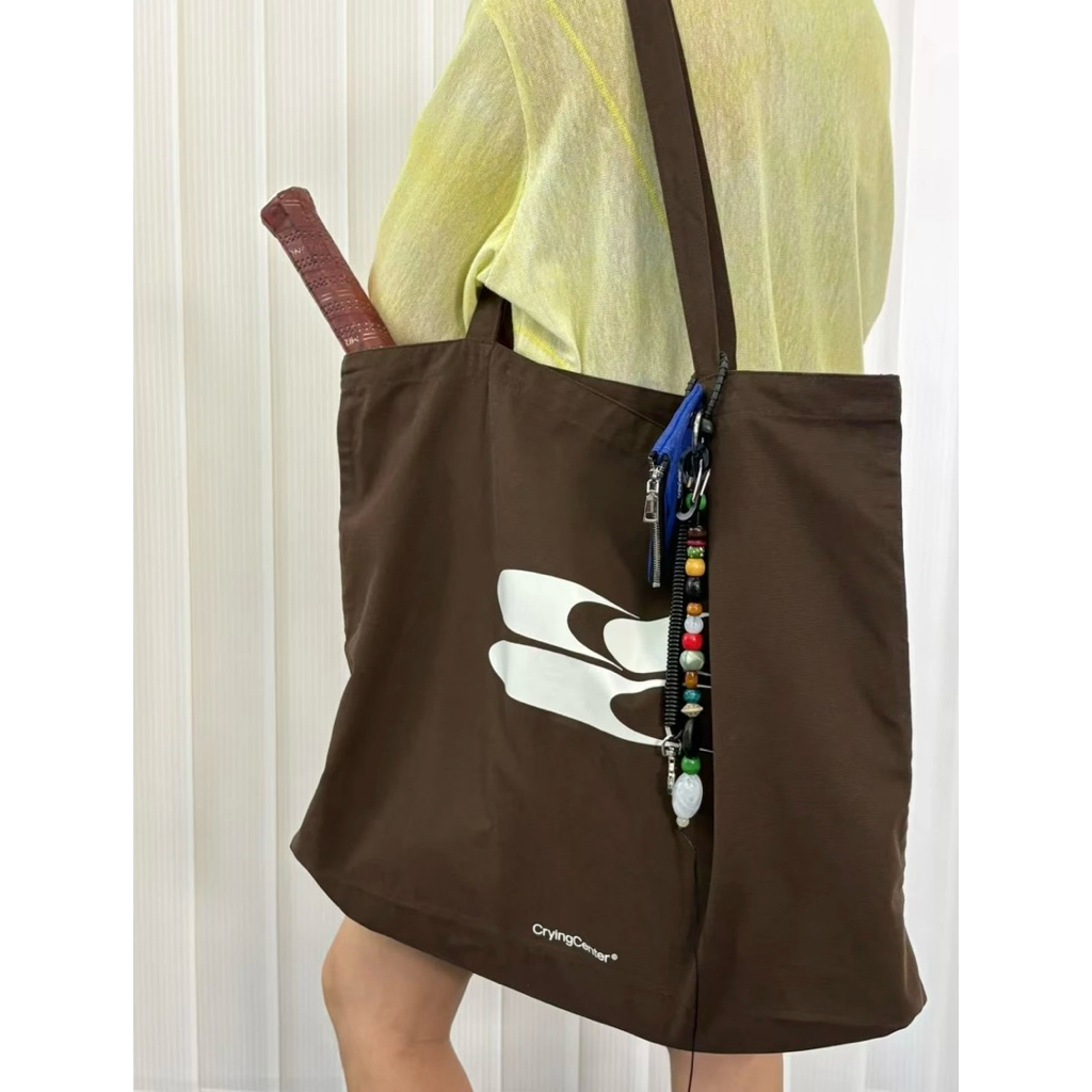 พร้อมส่ง*pre-order🪴Crying Center tote bag กระเป๋าผ้า (รอบโปรจำกัด) (โค้ดลด20%) จากช็อปแท้💯