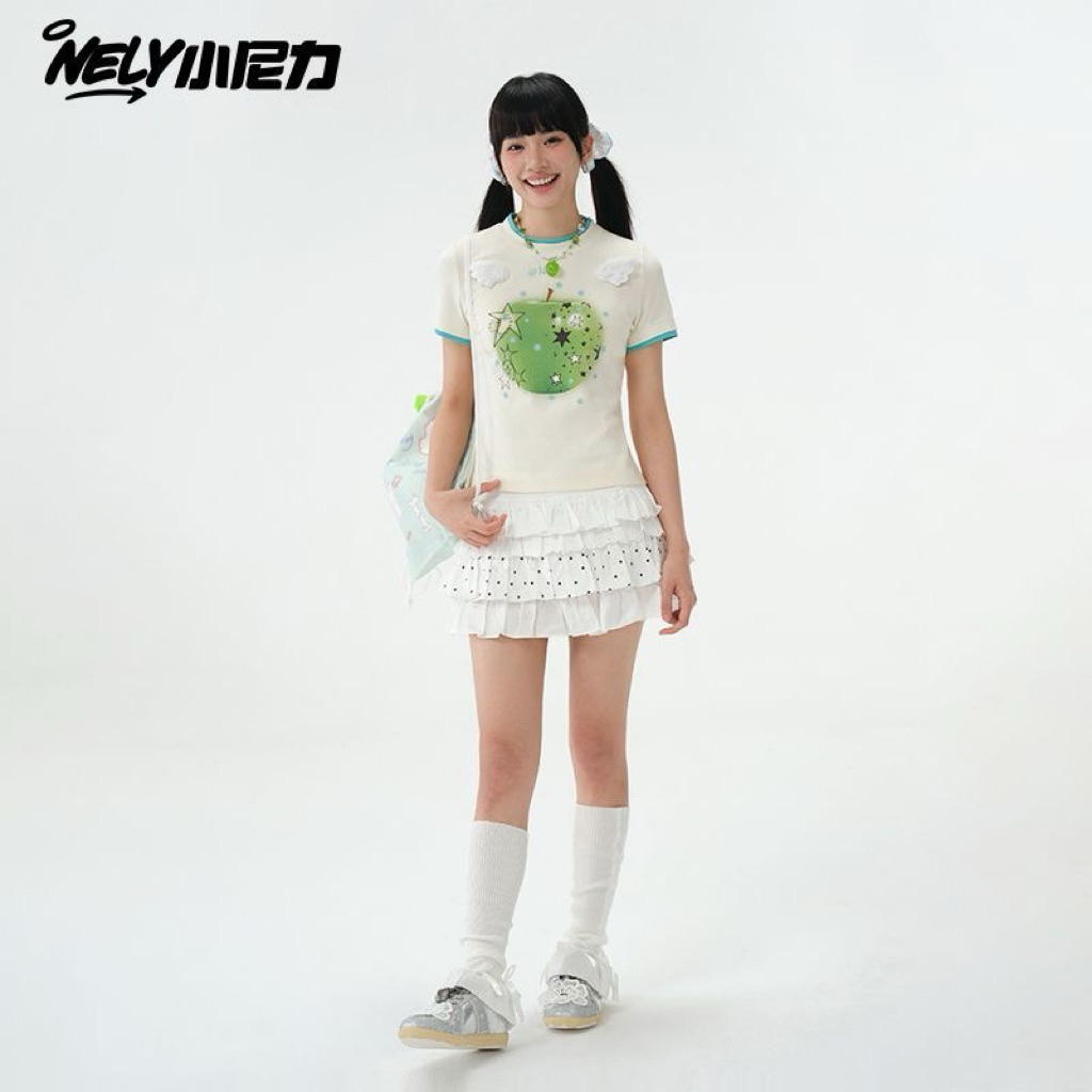 พร้อมส่ง/แท้⭐️🐠 เสื้อยืดNelly ลายแอปเปิลติดปีก