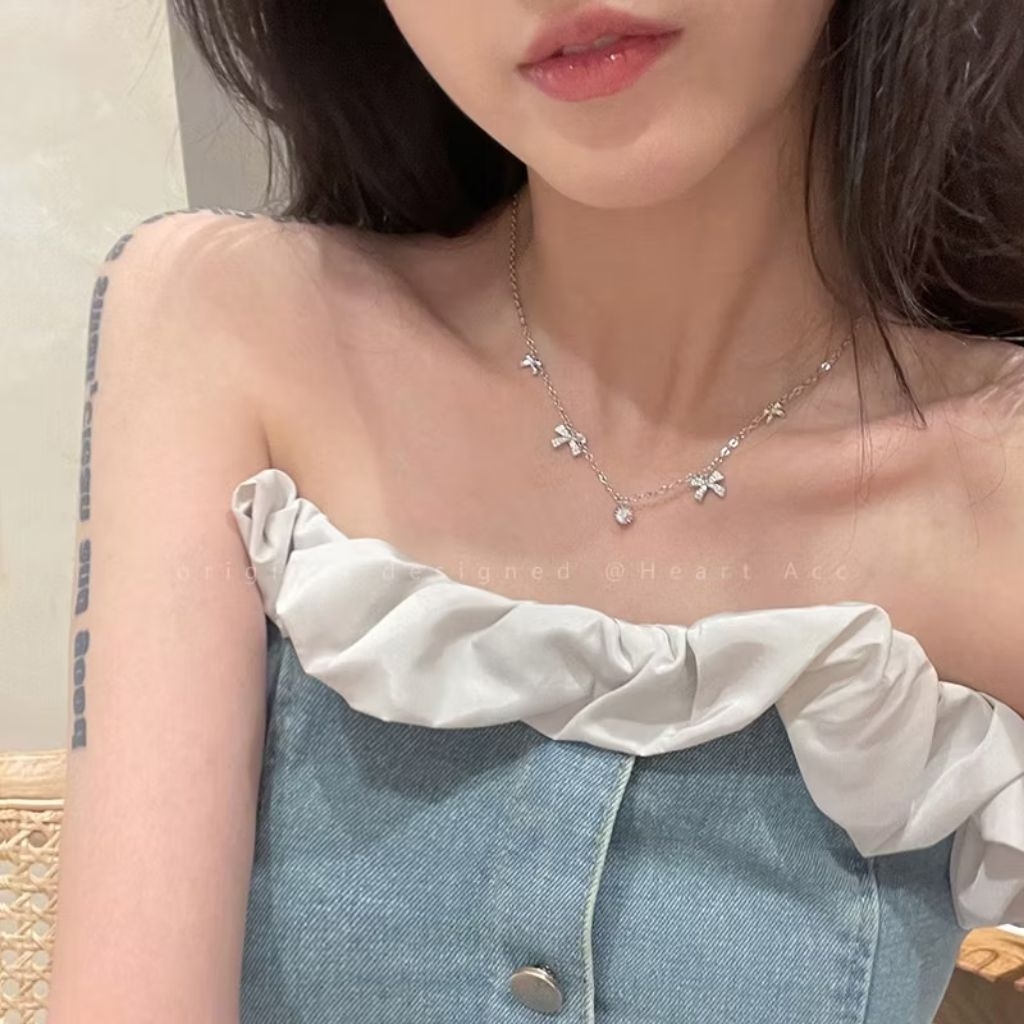 สร้อยคอโบว์คริสตัล • Crystal Ribbon Necklace