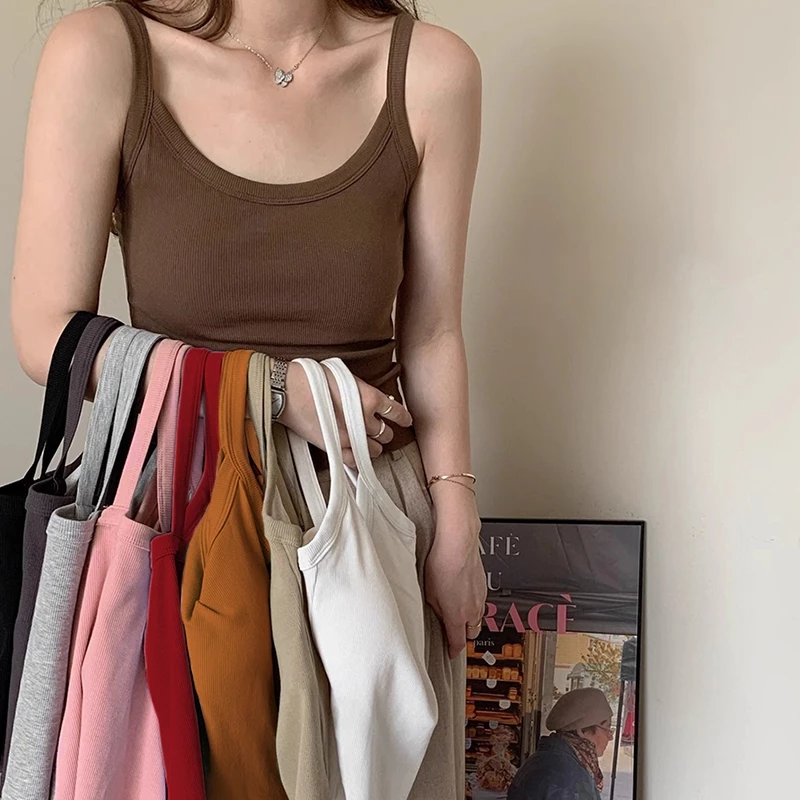 เสื้อสายเดี่ยว (S-3XL) ทรงครอป มีฟองน้ำในตัว เหมาะกับสาวๆสายเที่ยวสายไปคาเฟ่ สีสันสดใส ผ้าใส่แล้วไม่ร้อน แฟชั่นยอดนิยม