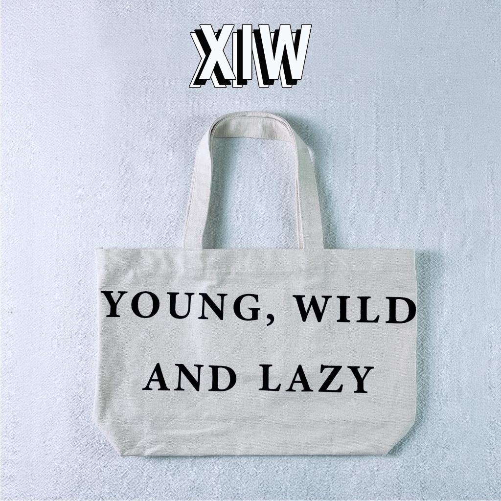 YOUNG, WILD AND LAZY Tote Bag