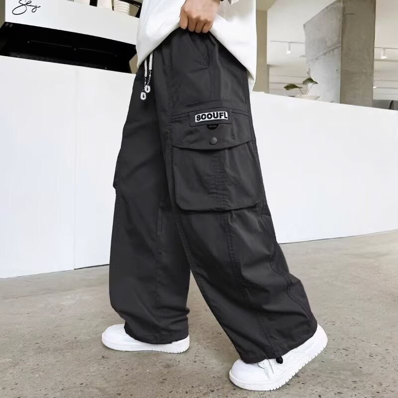 130-160cm กางเกงเด็กผู้ชายสไตล์เวิร์กแวร์ กางเกงคาร์โก้เด็ก กระเป๋าหลาย หลวม แฟชั่นเวอร์ชั่นเกาหลี ใหม่ หลวม【COD】