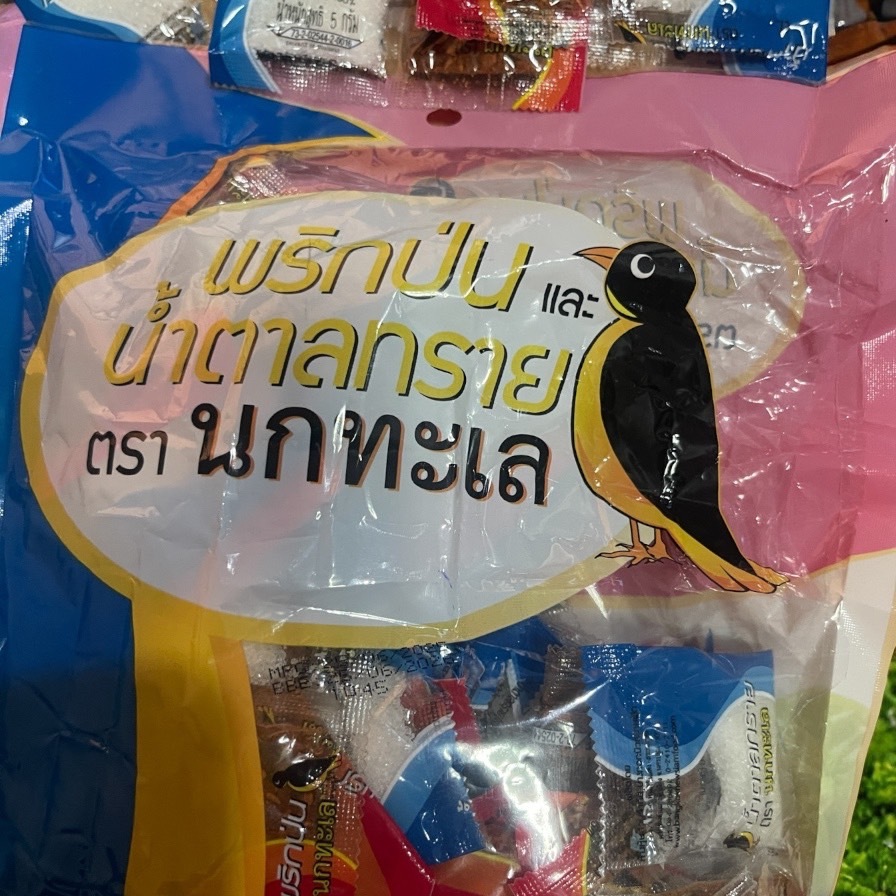 พริกป่นและน้ำตาลทราย ตรา นกทะเล บรรจุ 50 ซอง