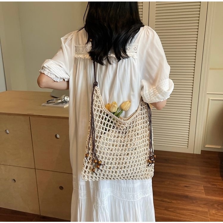 B390） Hand woven hollow tote bag for women new vacation style grass woven bag single shoulder casual large capacity bag