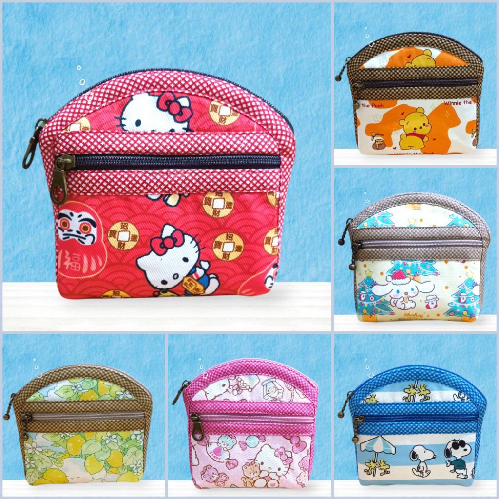 กระเป๋าสตางค์ แบบที่ 7 รุ่นทรงปากโค้ง มี 2 ซิป 3 ช่อง ผลิตจากผ้าโพลีกันน้ำ ใช้ใส่บัตร ใส่เหรียญ แบงค์พับครึ่ง