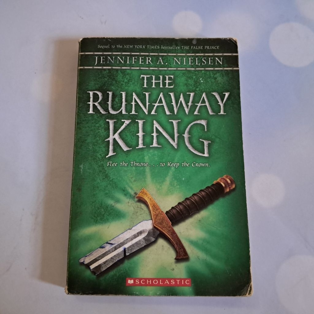 #มือสอง #Q : #The Runaway King by Jennifer A. Nielsen.