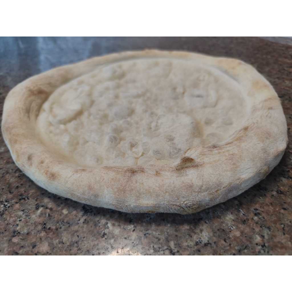 Pizza dough 7 inches 15 cm baked in stone oven
