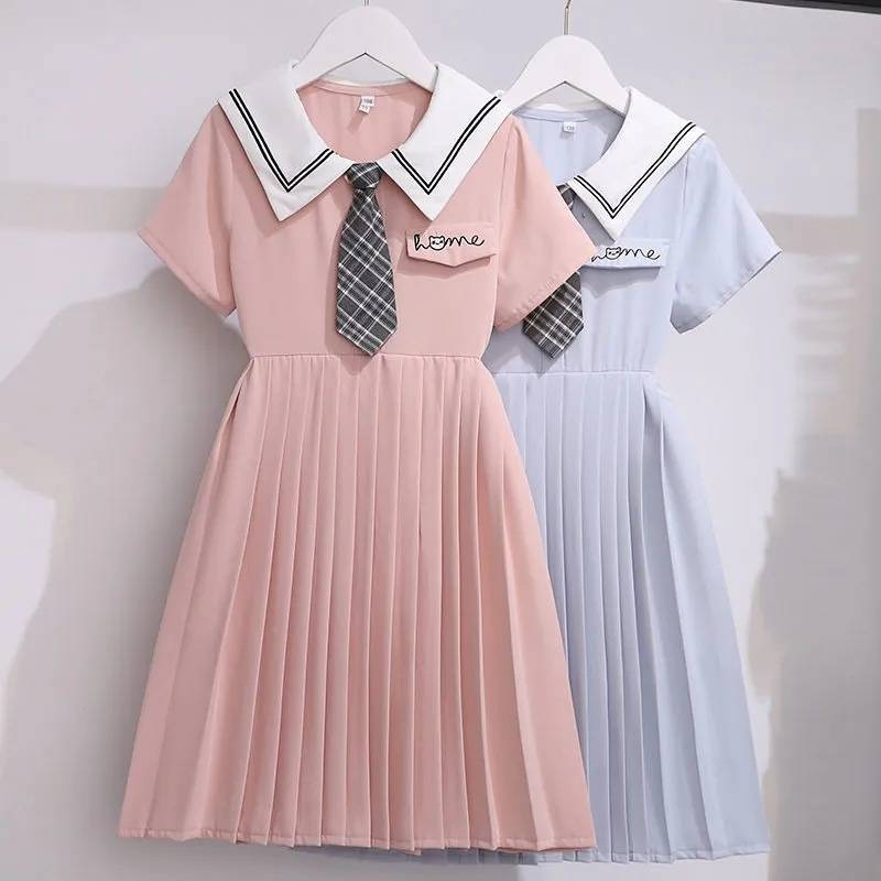 (พร้อมส่ง) ชุดเด็กโต เดรสกระโปรงจีรอบมีเน๊คไทน์เเยกมา ผ้าดีใส่สบาย