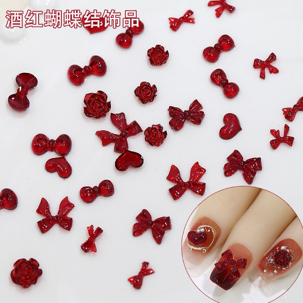 โบว์เรซิ่นสีแดง สำหรับแต่งเล็บ 50 ชิ้นต่อแพ็ค