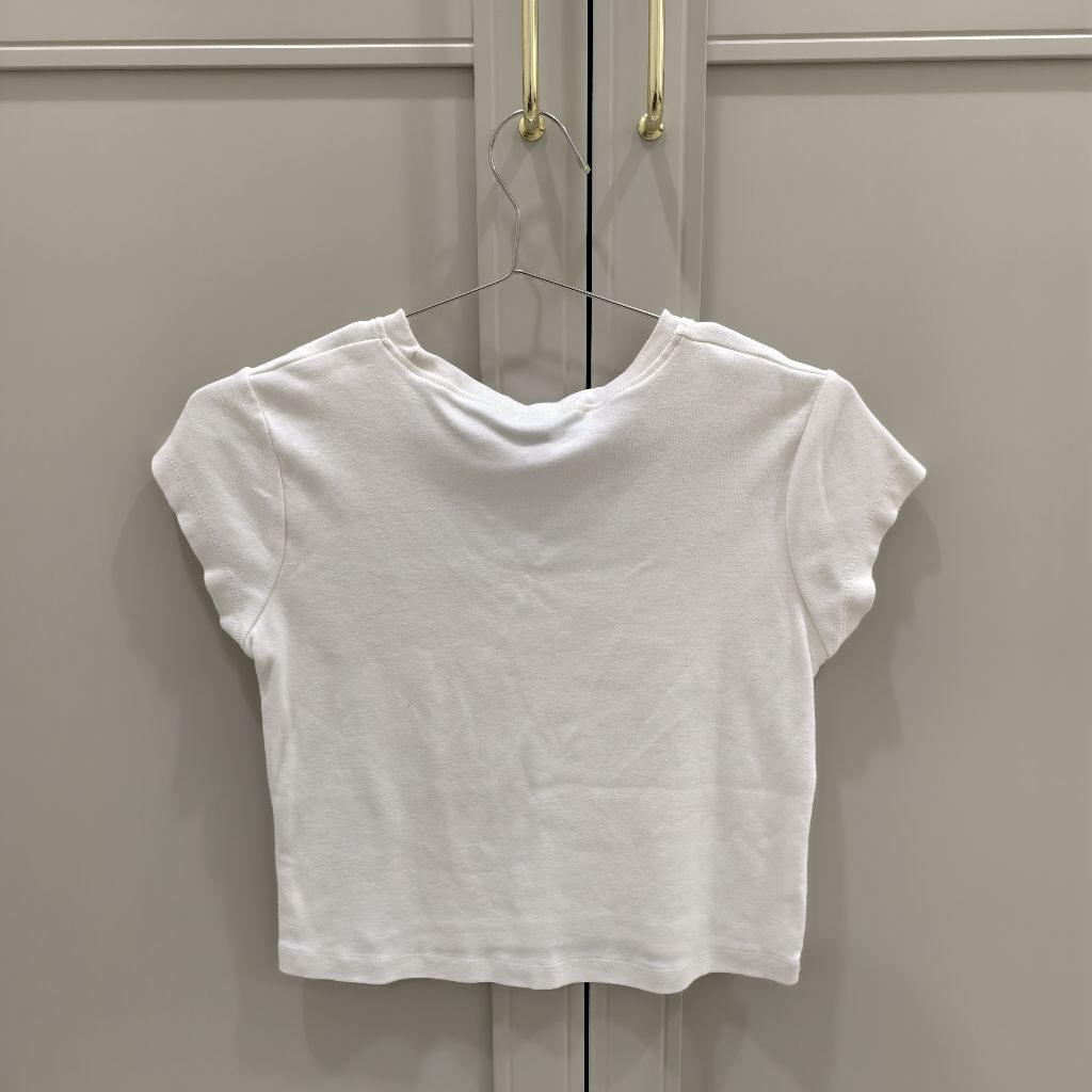 เสื้อเบบี้ที สีขาว ป้าย STORE851