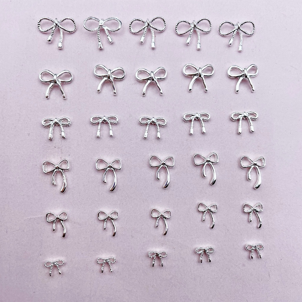 อะไหล่โบว์เงิน ตกแต่งหน้าเล็บ ติดของอเนกประสงค์ 10 ชิ้น/ห่อ สินค้าพร้อมส่ง