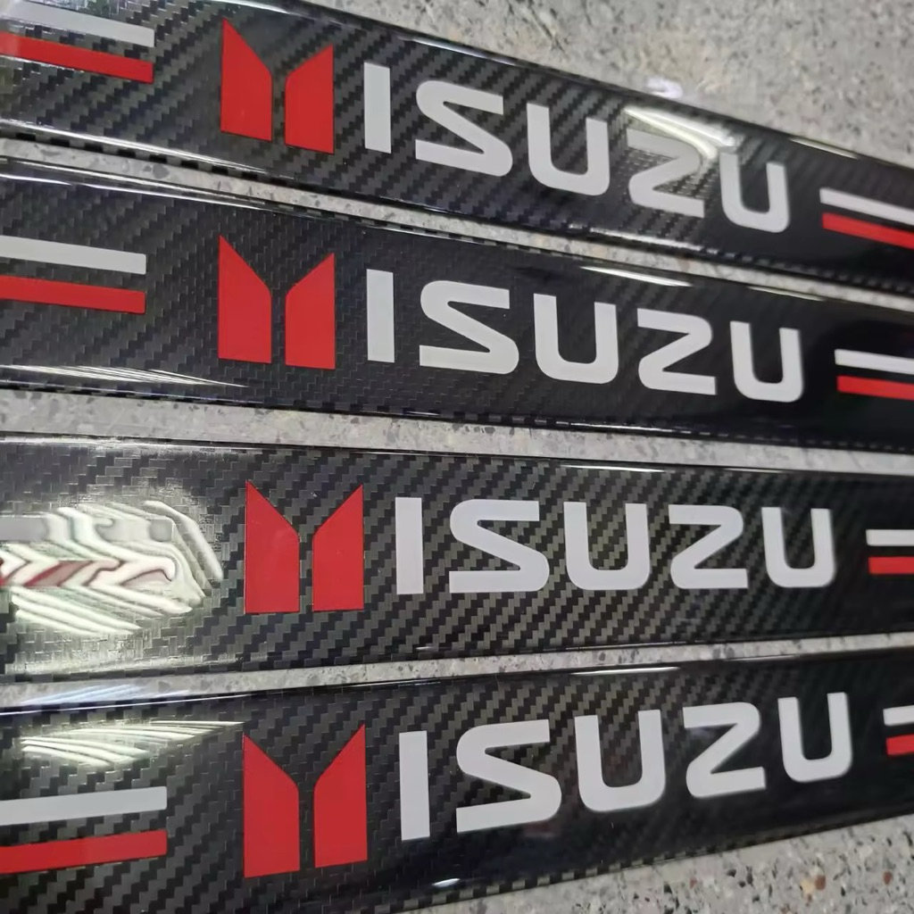 เคฟล่ากันรอยชายบันไดรถยนต์ กาวในตัว กันน้ำ โลโก้ ISUZU  บนยาว 38 CM. ล่างยาว 52 CM สินค้าจัดส่งจากในประเทศ จัดส่งไว
