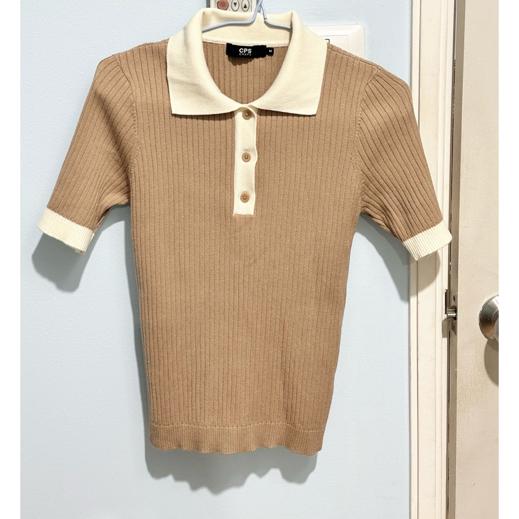 เสื้อยืดคอปก CPS size M สภาพใหม่