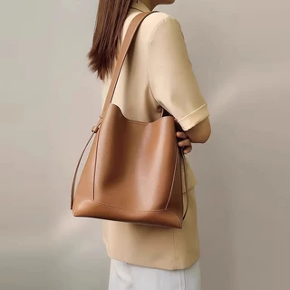 กระเป๋าแฟชั่นสุภาพสตรีกระเป๋าสะพายไหล่ สไตล์เกาหลี Bucket Bag กระเป๋าถังหนังแท้คลาสสิก กระเป๋าสะพายไหล่ Crossbody Bag