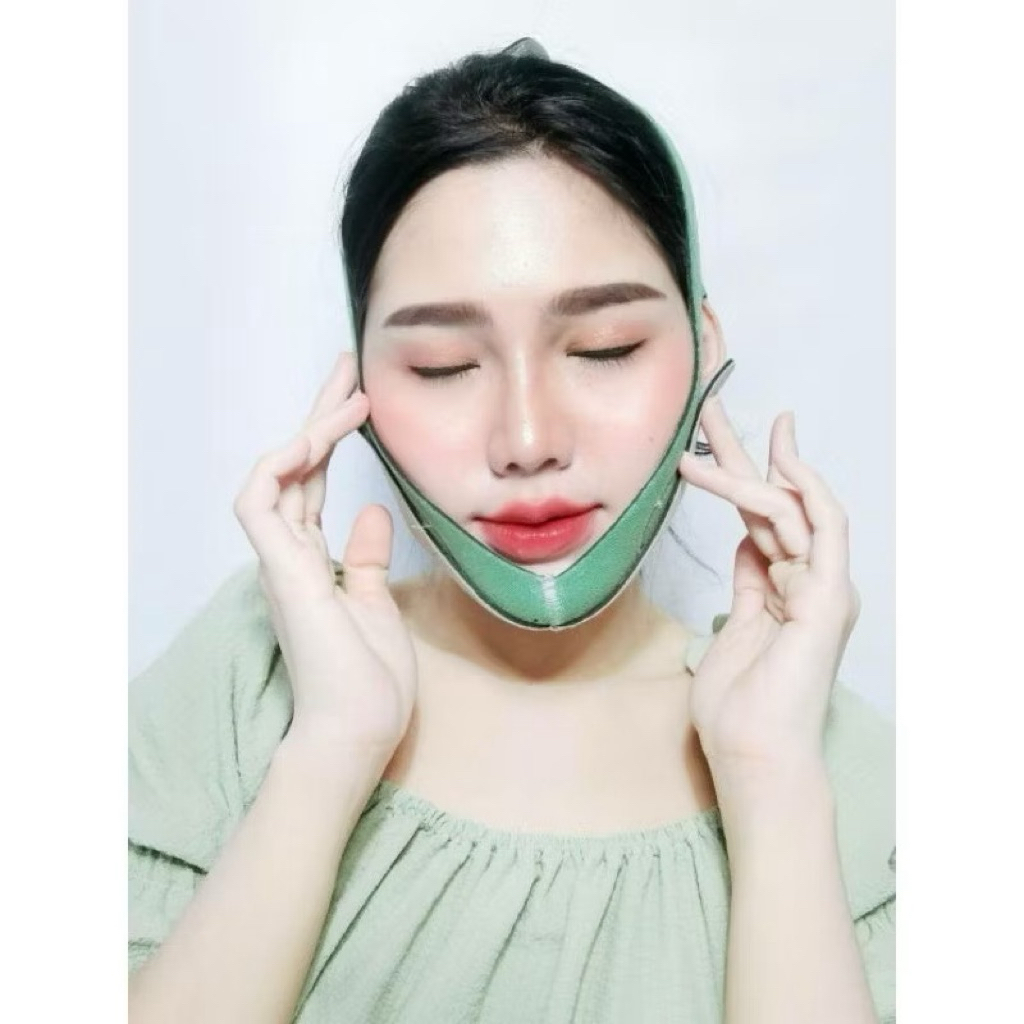 สายรัดหน้าเรียวพร้อมส่งGREEN GRAPHENE FACE MASKสายรัดหน้าเรียวช่วยปรับรูปหน้า
