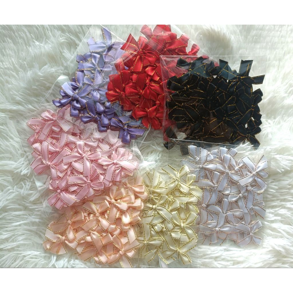 โบว์ ริบบิ้นผ้าซาติน ขอบทอง 10 มิล (ซองละ 50 ชิ้น)