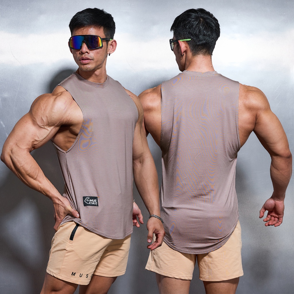 Musculo เสื้อกล้ามเล่นยิม ทรงยาวชายโค้งเปิดปีก