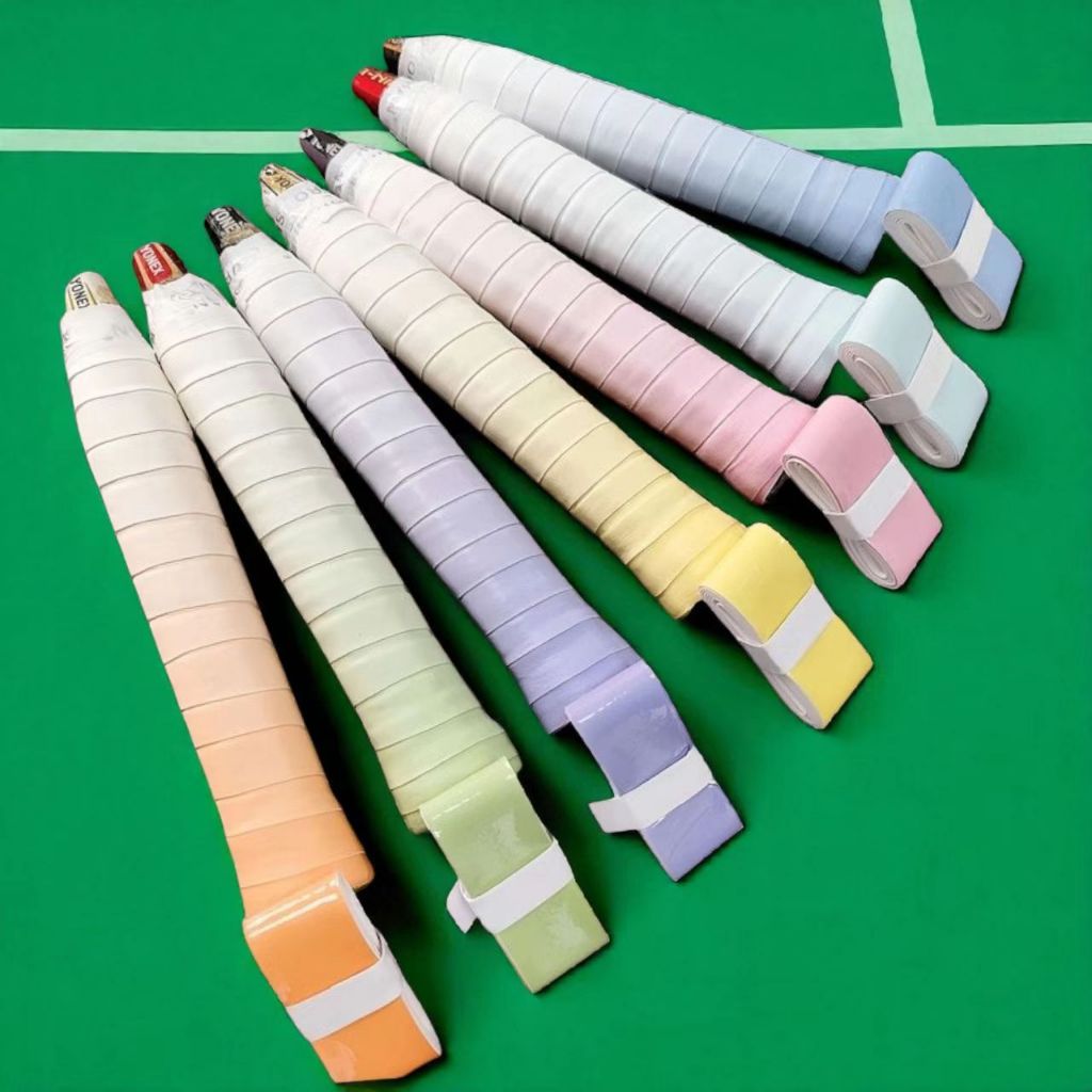 [24/7]พร้อมส่ง เทปพันด้ามแบดมินตัน ไล่สีพาสเทล กันลื่น ซึมซับเหงื่อ หนา 0.65 มม. (ไม่ใช่ของ Yonex)