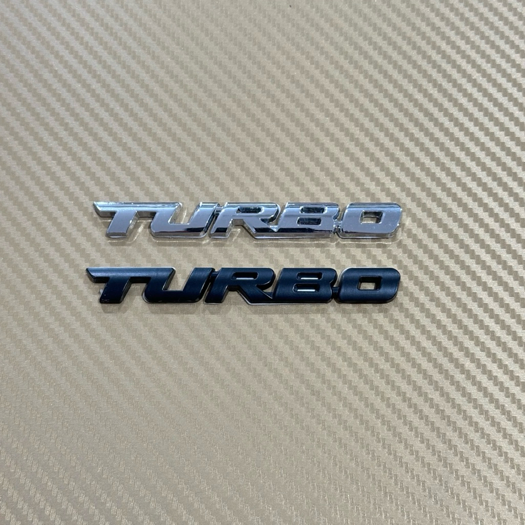 โลโก้* TURBO  สีเงิน / สีดำ / งานโลหะ  ขนาด* 1.3 x 9.8 cm ราคาต่อชิ้น