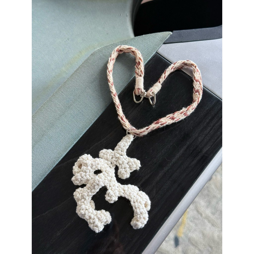 Handwoven biege cotton necklace with white coral