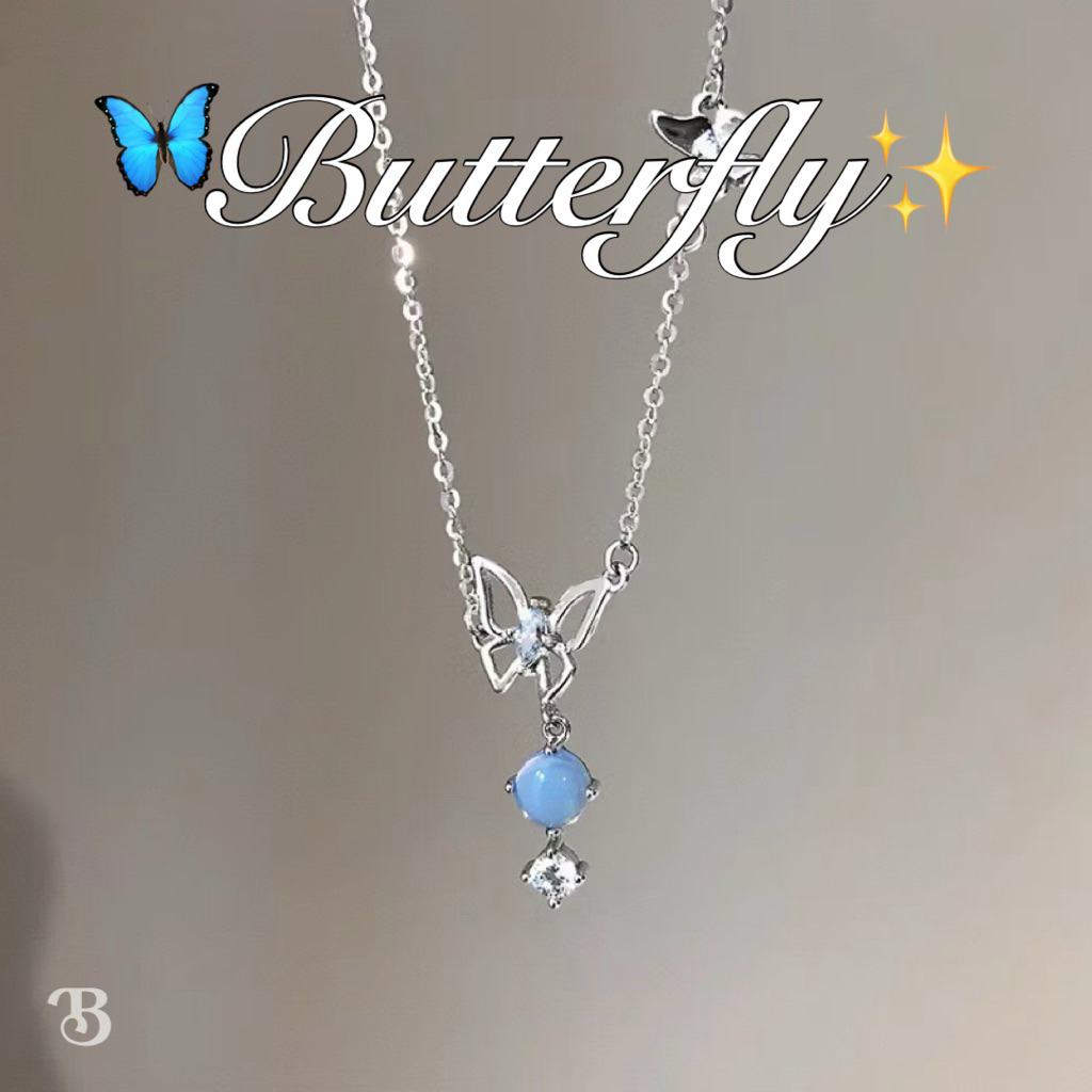 ꒰ สร้อยคอผีเสื้อ Butterfly Aura ผีเสื้อประดับเพชร คริสตัลสีฟ้า สไตล์เกาหลี แมชง่ายได้ทุกชุด - Burwoodstore