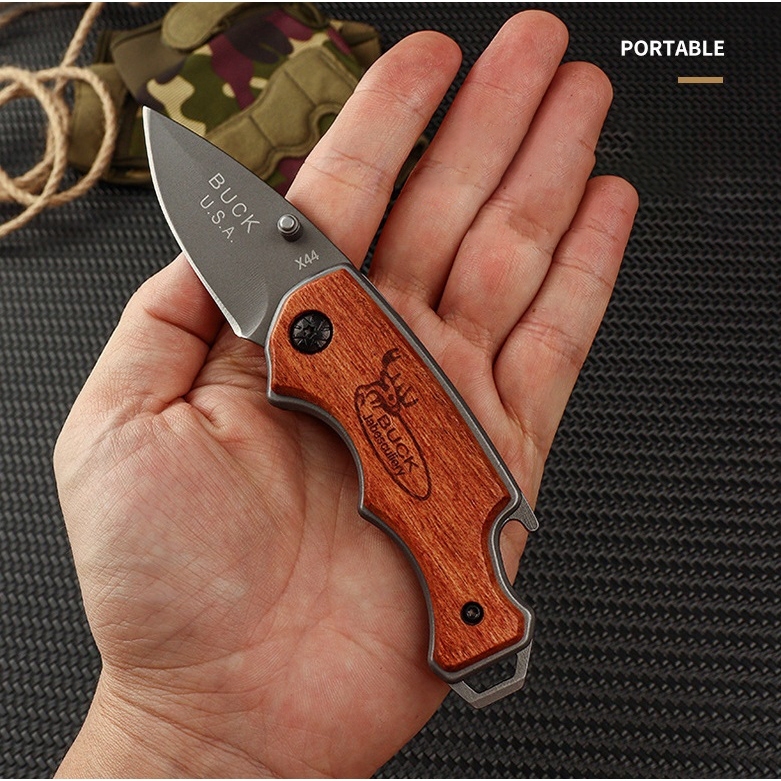 BUCK  มีดพับพกพา ด้ามจับไฟม้แท้ ขนาดกระทัดรัด พกง่าย น้ำหนักเบาแต่เข็งแรงมาก เดินป่า คุณภาพดี ทนทาน - รูปที่ 2