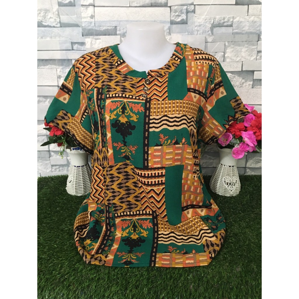 เสื้อลายดอก เสื้อสงกรานต์ ผ้าสปัน เสื้อคุณแม่  รอบอก 38-44 นิ้ว  รุ่น1009 สินค้า