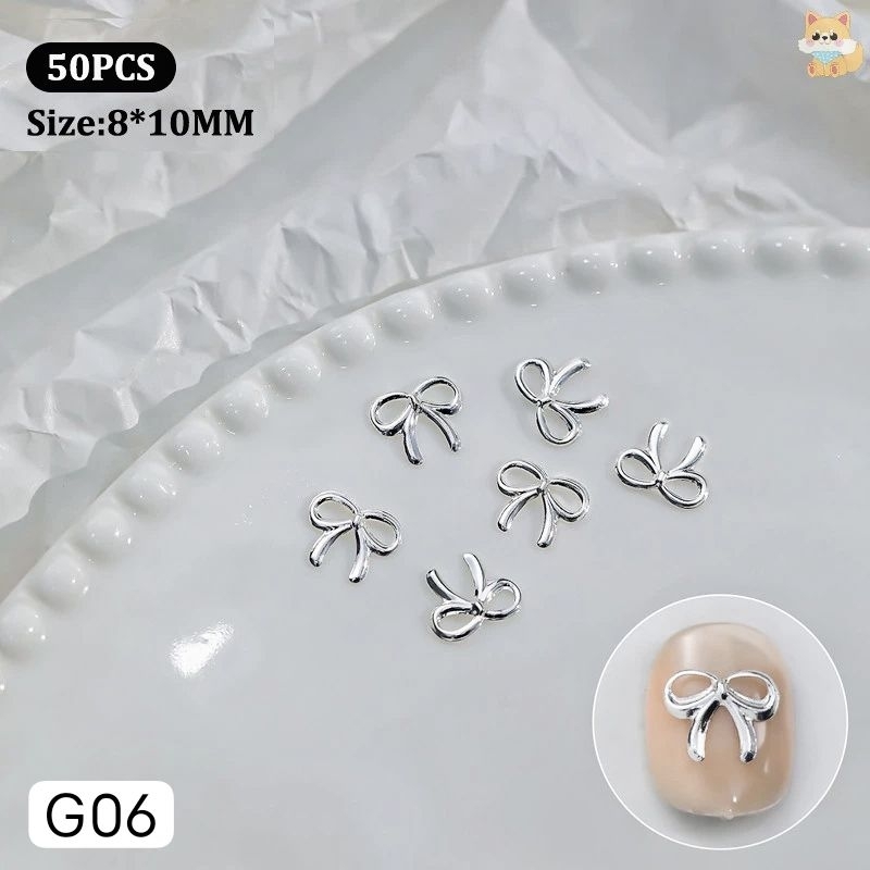 50ชิ้น อะไหล่เล็บ อะไหล่ทองติดเล็บ โบว์ติดเล็บสีทอง อะไหล่ตกแต่งเล็บ Mobeautyshop789