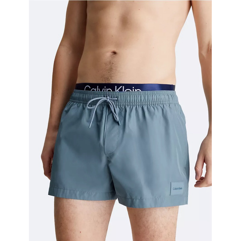 สินค้าพร้อมส่ง!! ของแท้เท่านั้น จาก Calvin Klein double waist band swim shorts กางเกงว่ายน้ำ