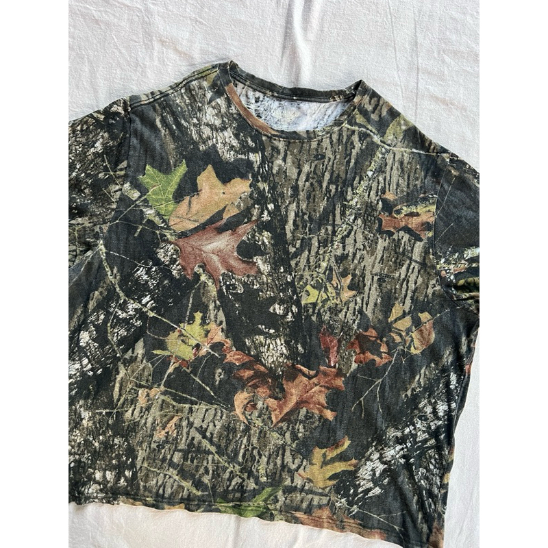 เสื้อยืดแขนสั้น ป่าไม้ ใบไม้ Realtree แบรนด์ IVORY X MOSSY OAK ลายนิยม สีเข้มสวย สภาพดี จัดได้คับ