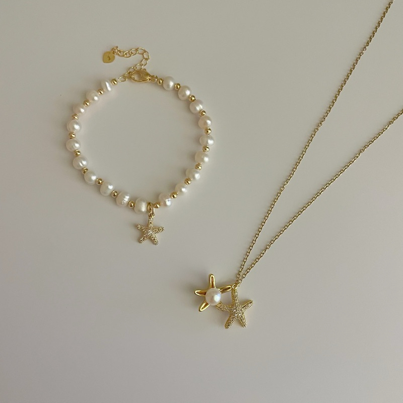 shellandgold - สร้อยและข้อมือมุกน้ำจืดแท้พร้อมจี้ปลาดาวและจี้เปลือกหอยตลับ ประดับเพชร - รูปที่ 2