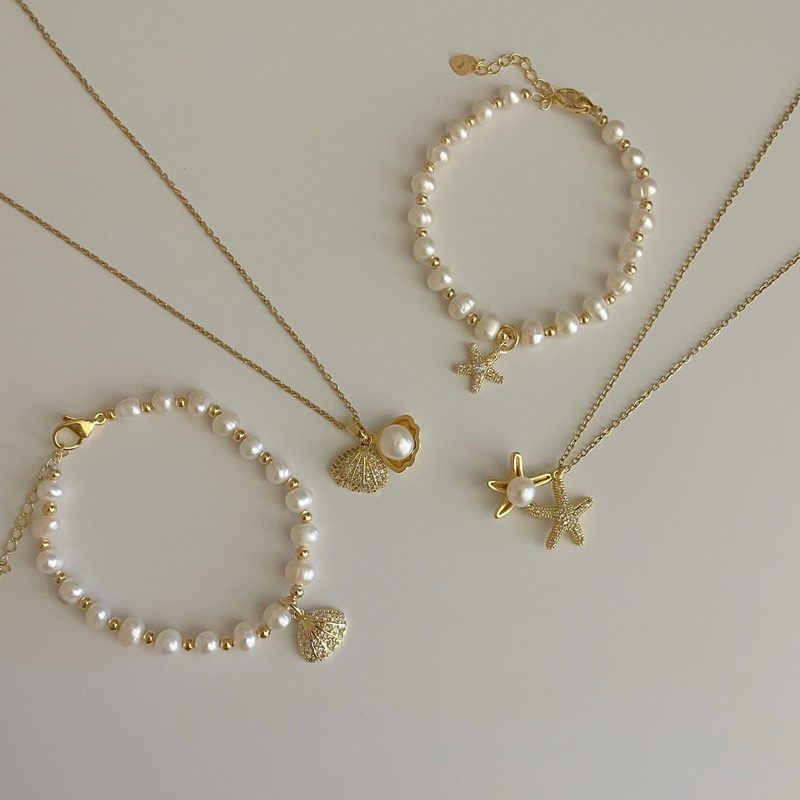shellandgold - สร้อยและข้อมือมุกน้ำจืดแท้พร้อมจี้ปลาดาวและจี้เปลือกหอยตลับ ประดับเพชร
