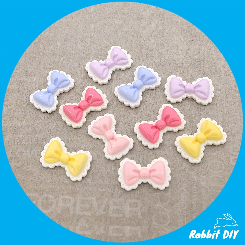 เรซิ่น โบว์ มีหลายสี ระบายขอบสีขาว (แพ็กรวมทุกสี 10 ชิ้น)