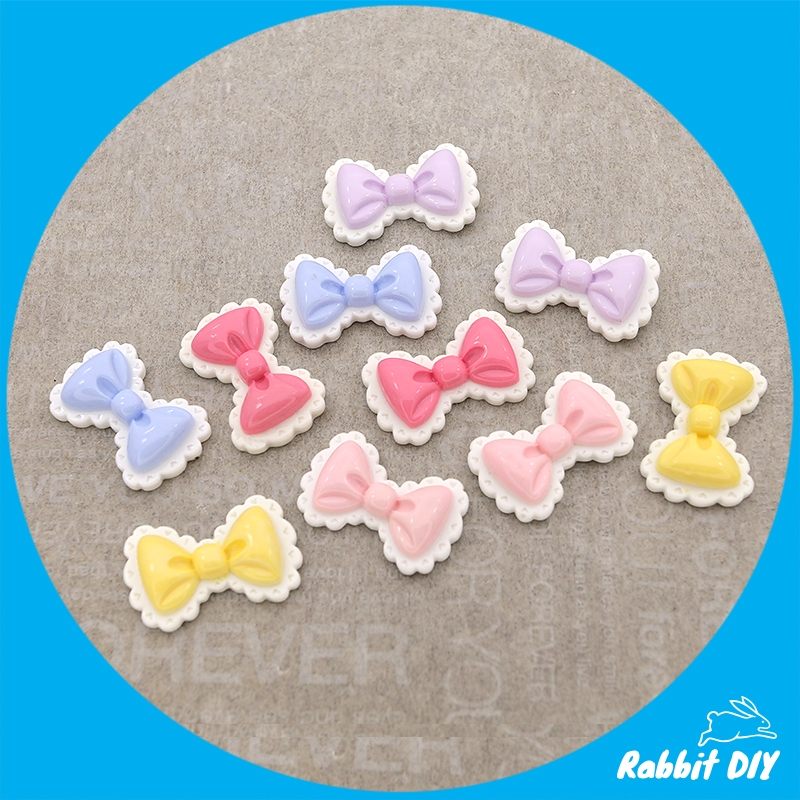 เรซิ่น โบว์ มีหลายสี ระบายขอบสีขาว (แพ็กรวมทุกสี 10 ชิ้น)