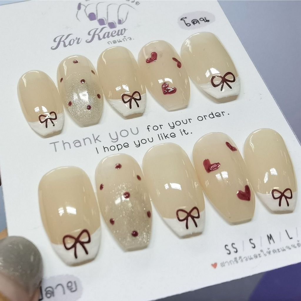 เล็บปลอมสำเร็จรูป(สีเจล100%) โบว์แดงลายจุดฟรีกาว+ตะไบ❌ไม่พร้อมรับของอย่ากดสั่งนะคะเห็นใจทางร้านด้วย❌