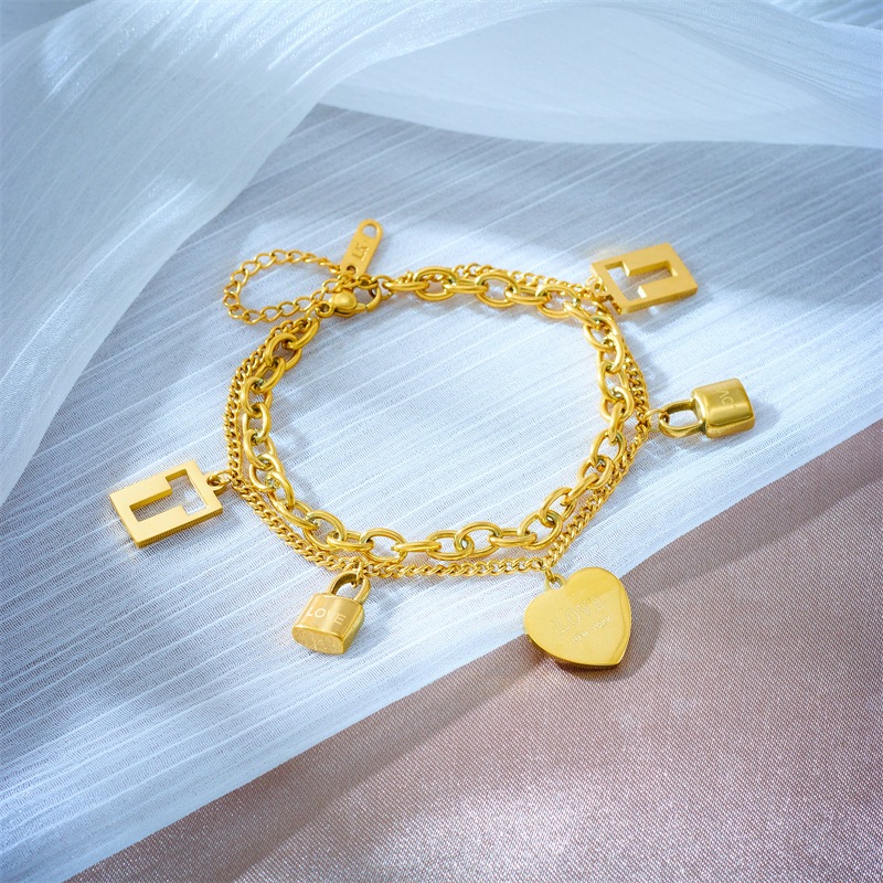 สร้อยข้อมือ 2 ชั้น สีทอง ไทเทเนียม สแตนเลสแท้ 316L สไตล์เกาหลี จี้หัวใจและล็อค ไม่ดำ ไม่ลอกสี CC23 - รูปที่ 4