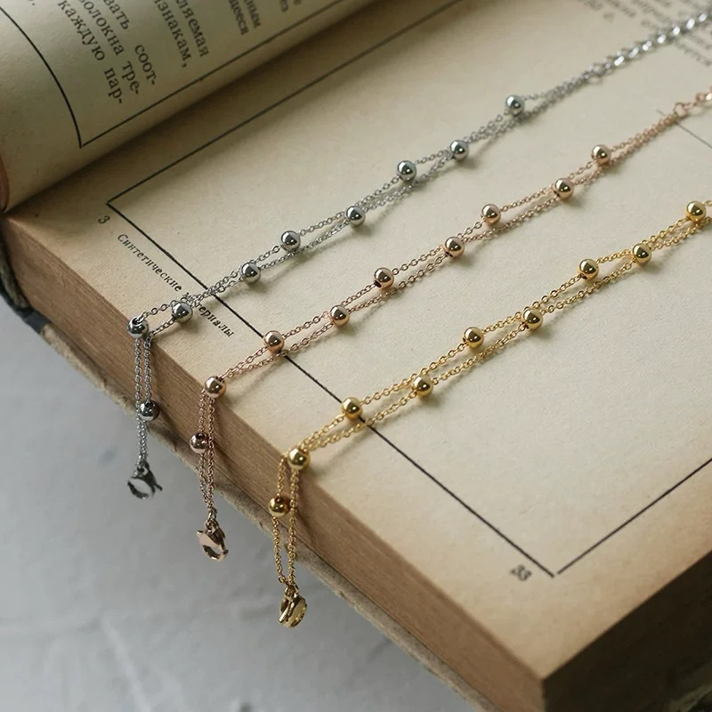 สินค้าใหม่ สร้อยข้อมือ2เส้น แบบ เลเยอร์ โซ่แบบตุ่ม ลูกปัด งานสแตนเลสแท้ ปลับขนาดได้