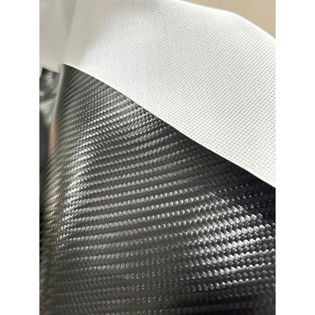 หนังเทียม(PVC) หนังหุ้มเบาะมอเตอร์ไซต์ กันน้ำ ลายเคฟล่า (Kavlar) หนา 0.7 mm. หน้ากว้าง 137 cm.