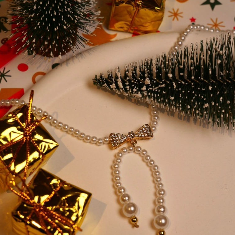 Sweetie Ribbon Necklace สร้อยคอลายโบว์