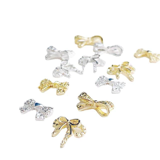 อะไหล่โบว์เพชรเงิน-ทอง ตกแต่งหน้าเล็บ 10 ตัว/ห่อ สินค้าพร้อมส่ง