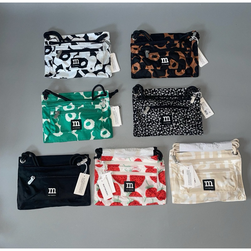 พร้อมส่ง T.27.N Marimekko smart travel bag ของแท้100% (กระเป๋าผ้า,ถุงผ้า,ถุงผ้าลดโลกร้อน) ผ้ากันน้ำ Polyester น้ำหนักเบา
