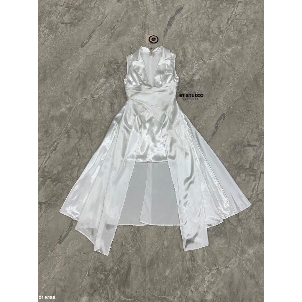 BT 01-5188 : เดรสสั้นแขนกุดคอปก ตรงกลางเอวแต่งระบายป้ายไขว้แต่งชายคลุมยาวลงมา ไปด้านข้างและด้านหลัง 