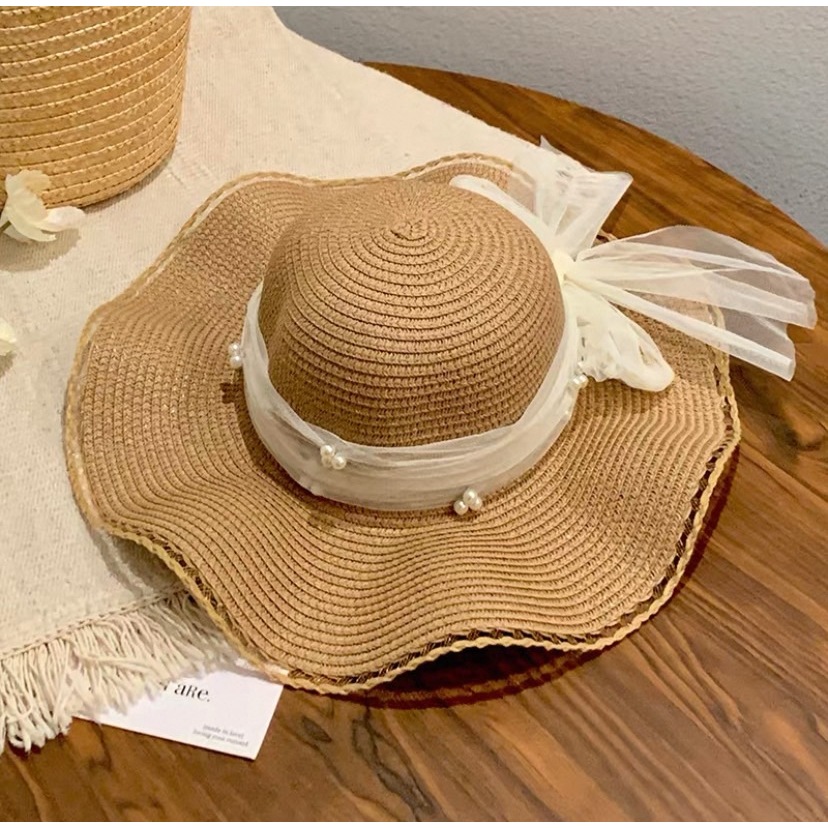 221หมวกปีกกว้างหมวกสาน  หมวกบัคเก็ตกันแดด โบว์ติดมุก  แฟชั่นสำหรับผู้หญิง - รูปที่ 7