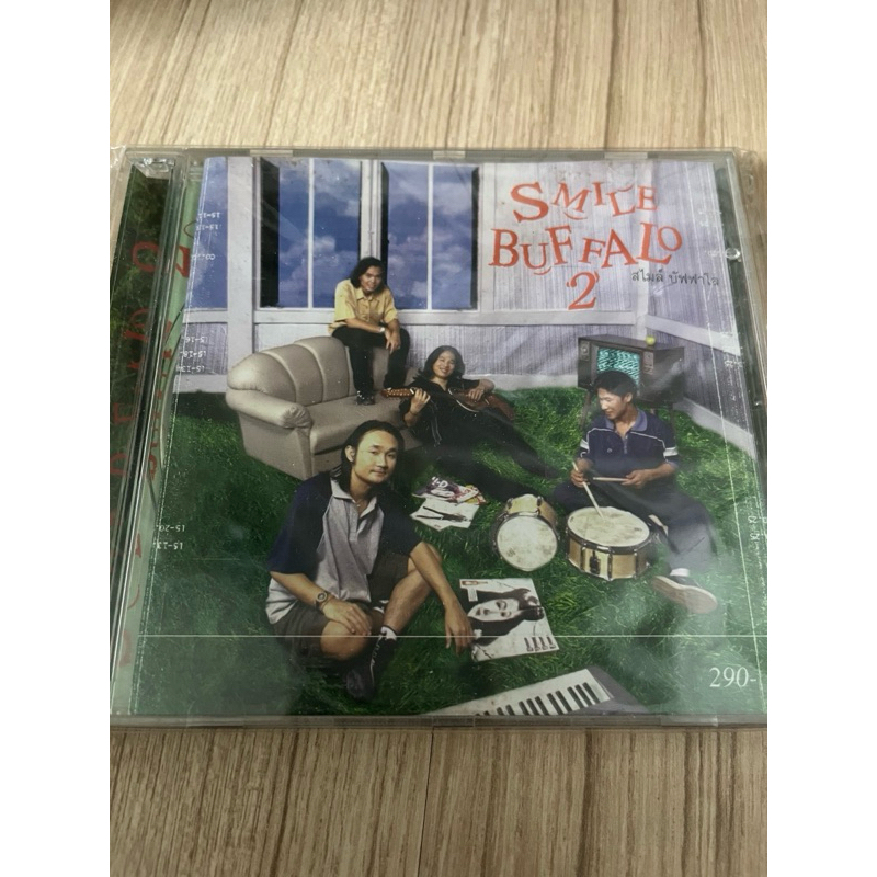 แผ่น ซี ดี เพลง smile buffallo  สภาพใหม่ หายาก เพลง เพราะฟัง ดี ทั้ง อัลบั้ม