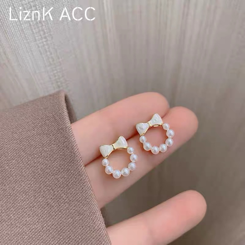 ต่างหู รูปโบว์ล้อมไข่มุก Sasa Earrings (รหัสER15)