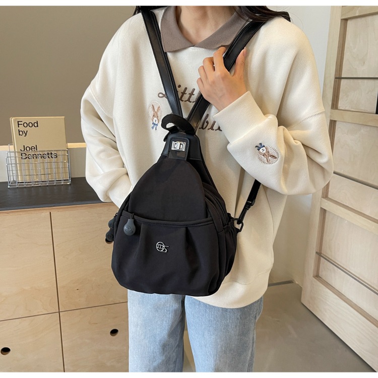 ใหม่ กระเป๋าเป้สะพายหลัง ผ้าแคนวาส สีพื้น สไตล์เรียบง่าย สําหรับผู้หญิง M761