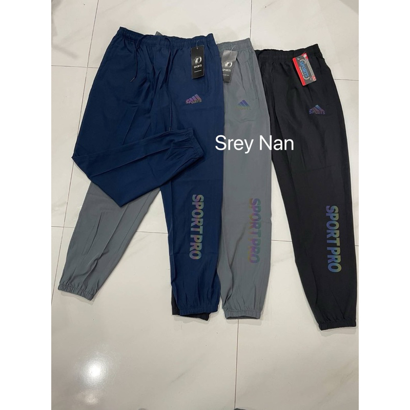 กางเกงวอร์มผ้าร่มไม่มีซับใน ขาปล่อย กลับขาจำ มีเชือก ด้านในรู ดาย กระเป๋าน้ามี ซิป2ขาง ผู้หญิงผู้ชายใส่ได้