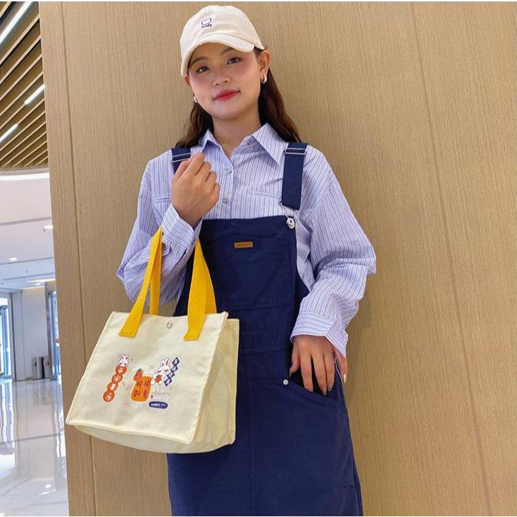 Fashion กระเป๋าถือ ผ้าแคนวาส ลายการ์ตูน น่ารักๆ  สไตล์เกาหลี มี2ขนาดให้เลือก พร้อมส่งจากไทย B-860